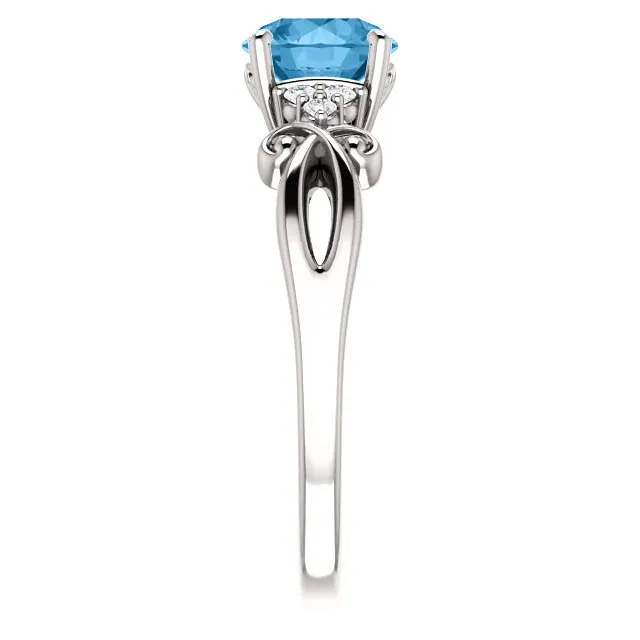 14KT GOLD 1.30 CT SWISS BLUE TOPAZ & 0.06 CTW DIAMOND ACCENT RING