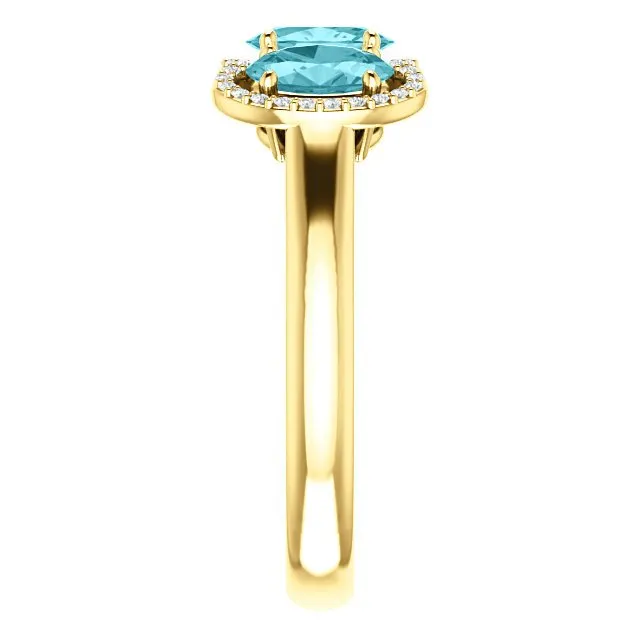 14KT GOLD 2.25 CTW BLUE ZIRCON & 0.10 CTW DIAMOND 3 STONE OVAL HALO RING