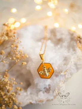 Amber hexagon and bee pendant necklace